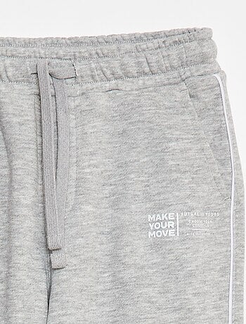 Joggers in french terry con bordino a contrasto