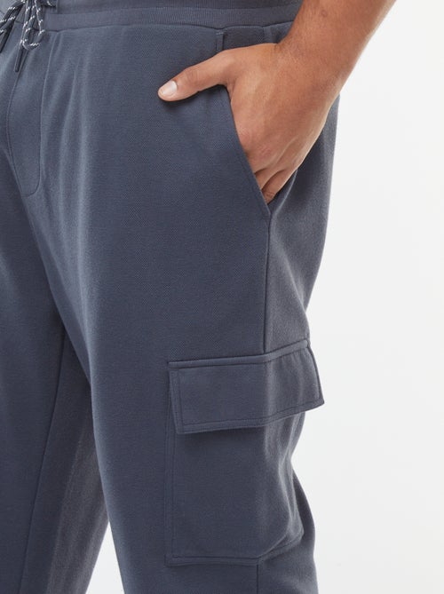 Joggers in maglia piqué con tasche con patta - Kiabi