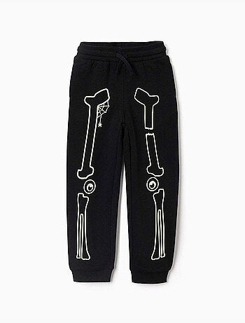 Joggers in pile con stampa che si illumina al buio