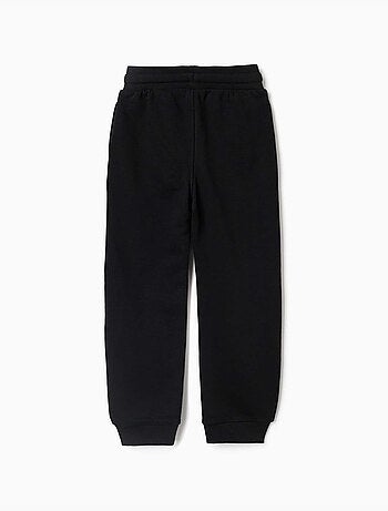 Joggers in pile con stampa che si illumina al buio