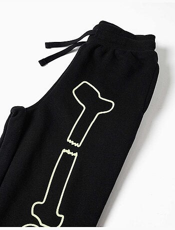 Joggers in pile con stampa che si illumina al buio