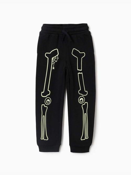 Joggers in pile con stampa che si illumina al buio - Kiabi Joggers in pile con stampa che si illumina al buio - Kiabi