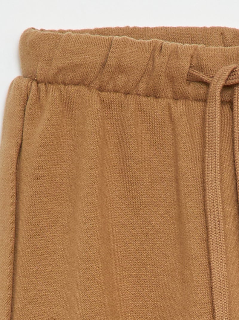 Joggers in tessuto felpato Beige - Kiabi