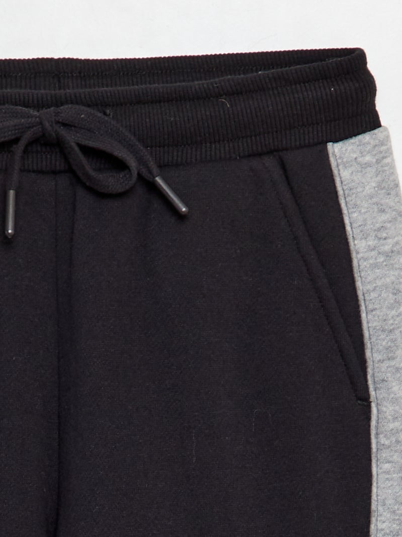 Joggers in tessuto felpato color block nero - Kiabi