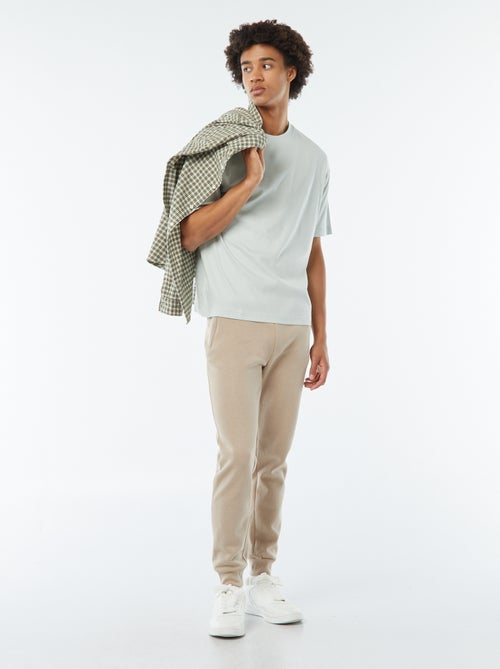Joggers in tessuto felpato con 2 tasche con zip - Kiabi