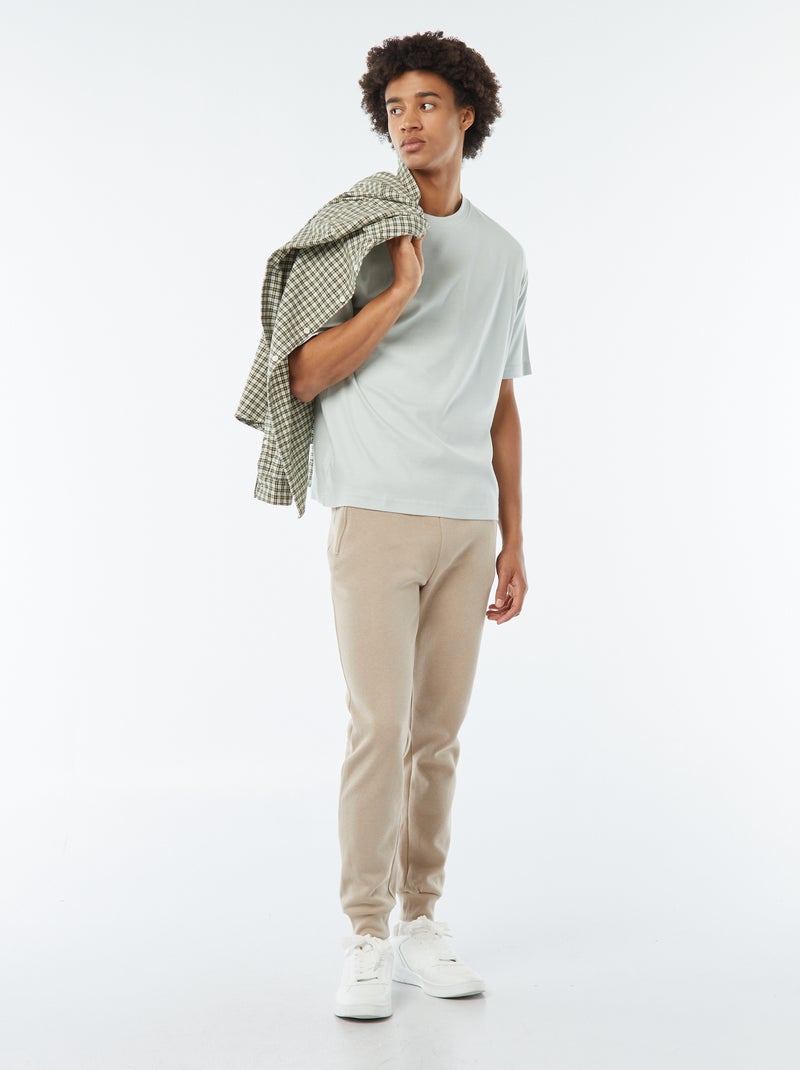 Joggers in tessuto felpato con 2 tasche con zip beige - Kiabi