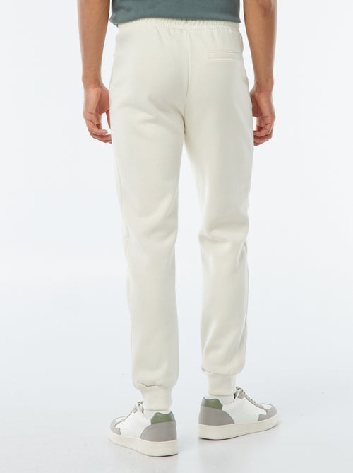 Joggers in tessuto felpato con 2 tasche con zip - Kiabi