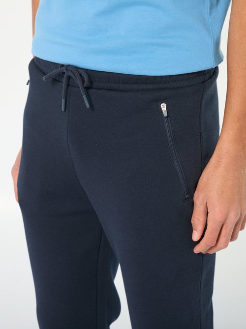 Joggers in tessuto felpato con 2 tasche con zip - Kiabi