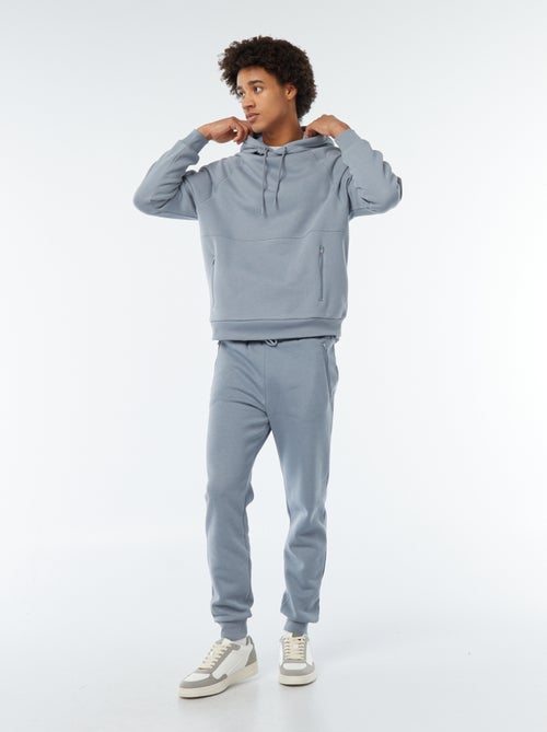 Joggers in tessuto felpato con 2 tasche con zip - Kiabi