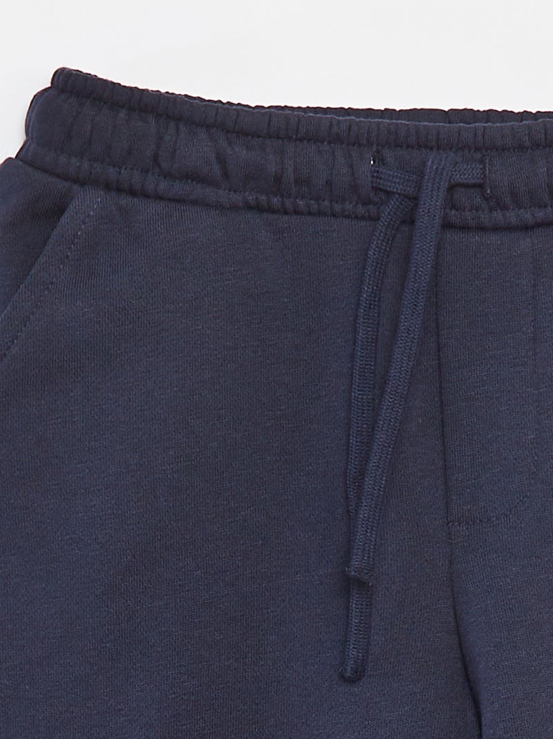 Joggers in tessuto felpato con tasche blu - Kiabi