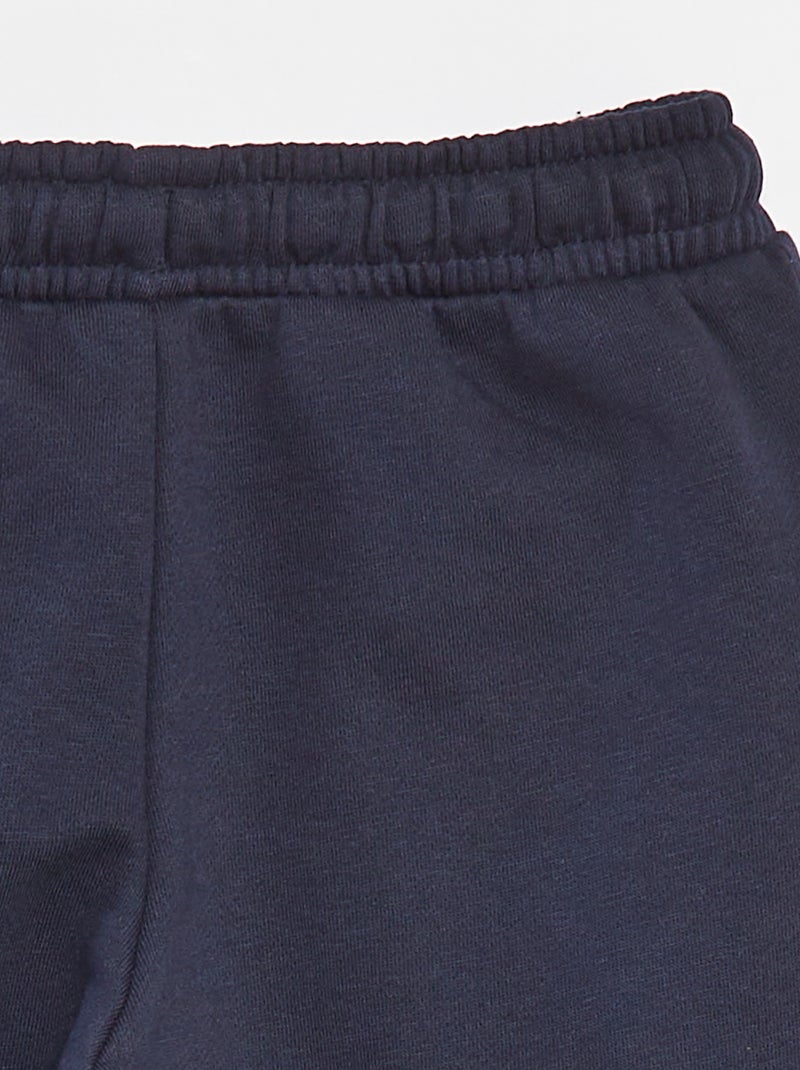 Joggers in tessuto felpato con tasche blu - Kiabi
