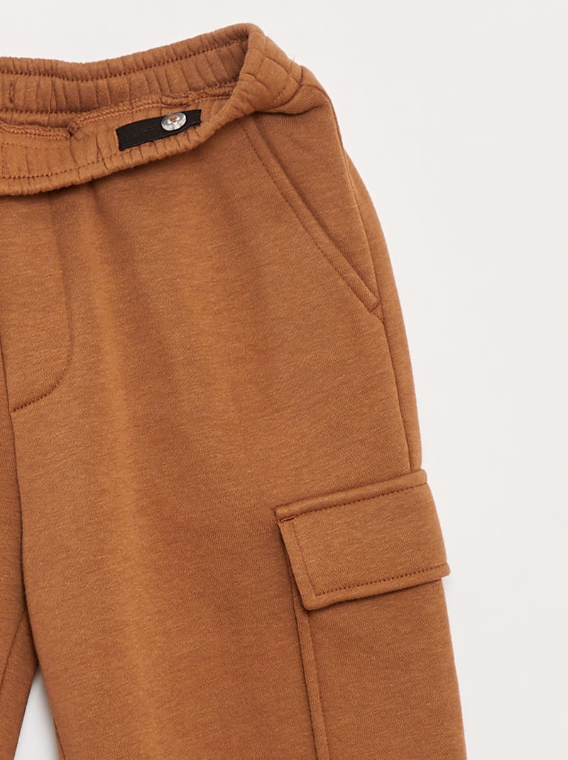 Joggers in tessuto felpato multitasche Beige - Kiabi