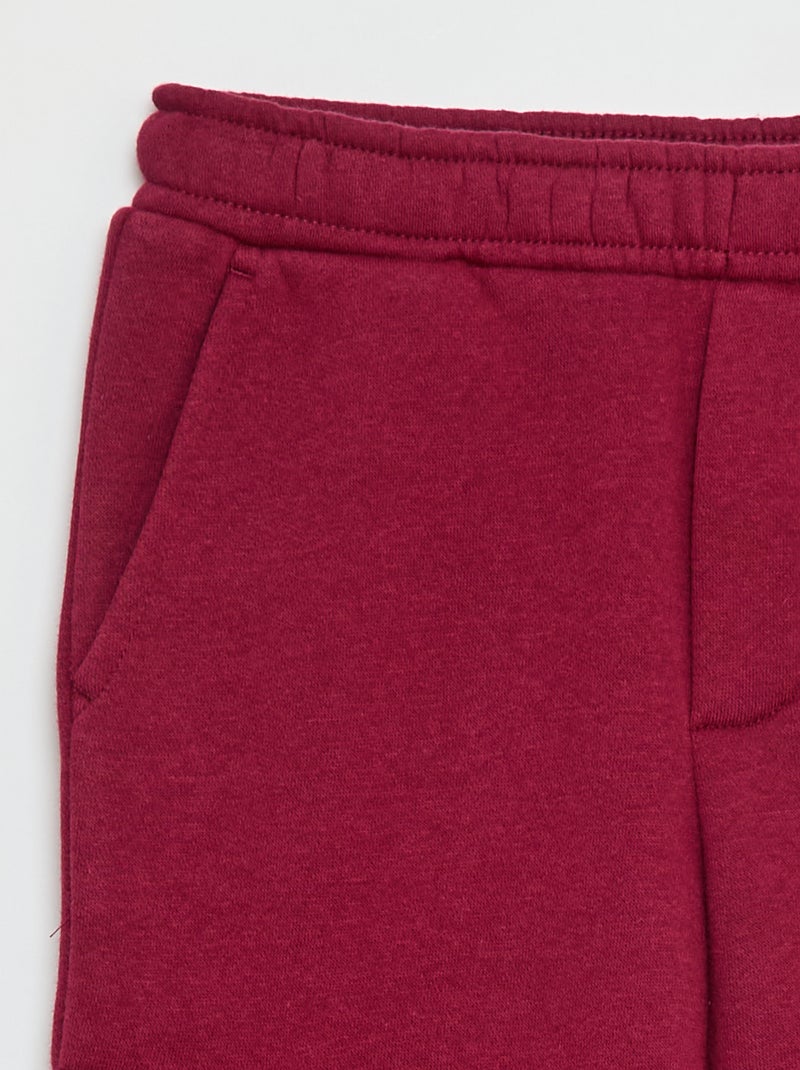 Joggers in tessuto felpato multitasche Rosso - Kiabi