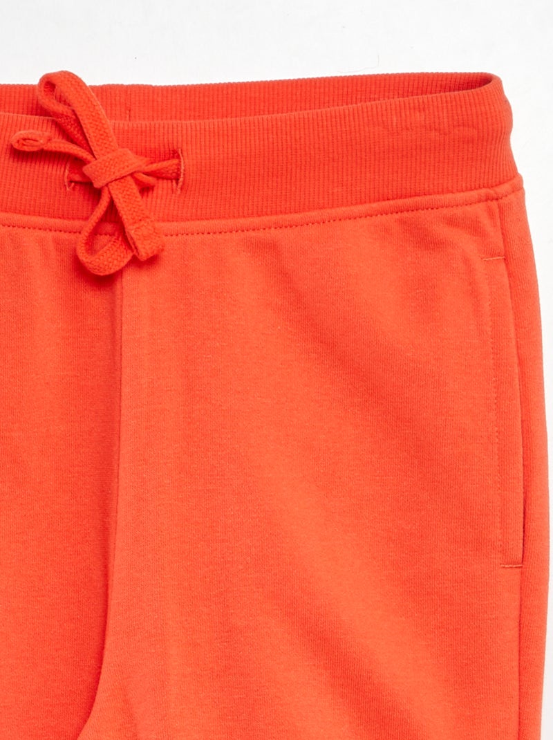 Joggers in tessuto felpato ROSSO - Kiabi