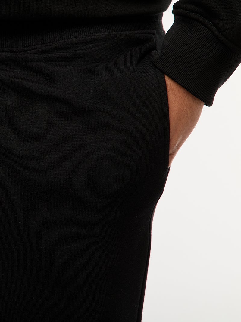 Joggers in tessuto felpato tinta unita nero - Kiabi