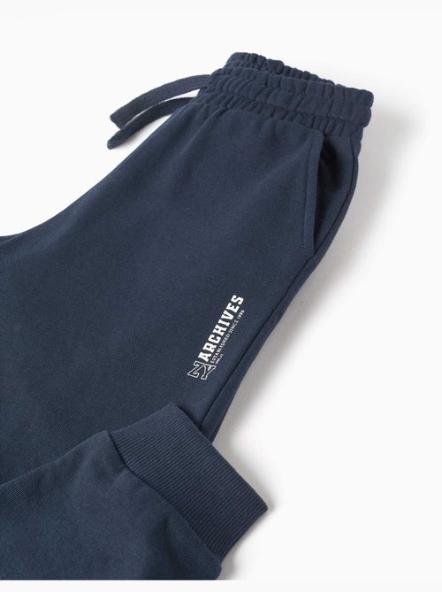 Joggers slim in pile con tasche e stampa ZY - Kiabi Joggers slim in pile con tasche e stampa ZY - Kiabi