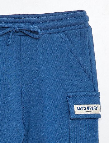 Joggers tinta unita con tasche con patta