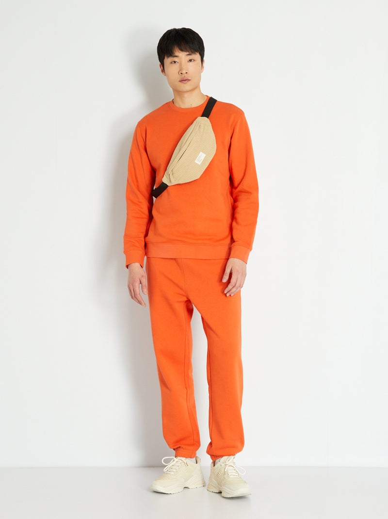 Joggers tinta unita in tessuto felpato ARANCIONE - Kiabi