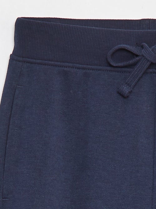 Jogging a tinta unita con vita elasticizzata - Kiabi Jogging a tinta unita con vita elasticizzata - Kiabi