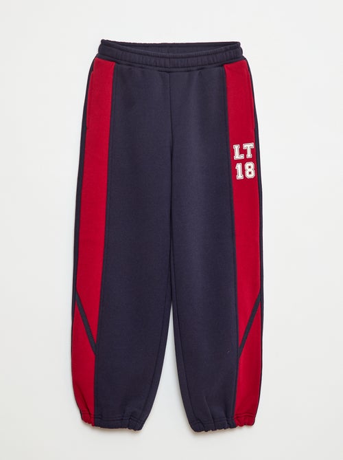 Jogging con bande a contrasto - Kiabi