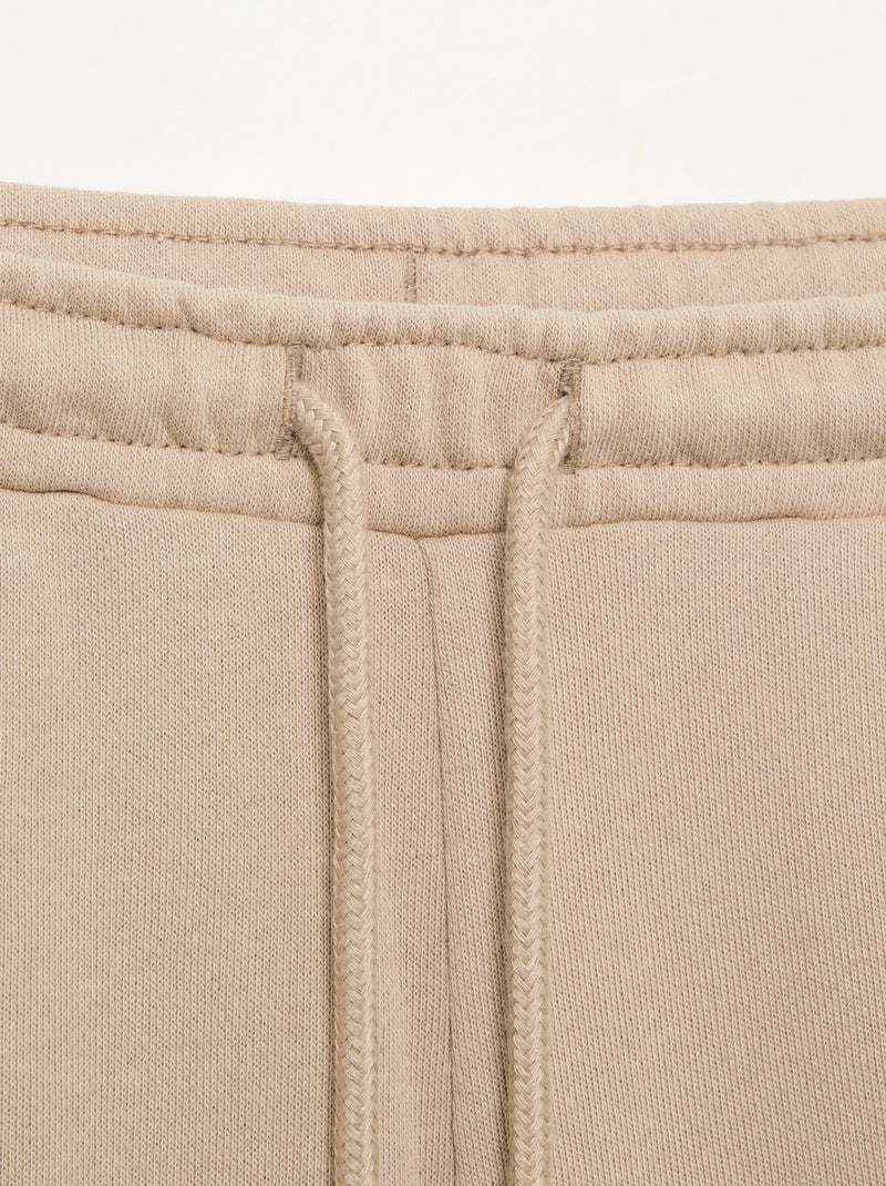 Jogging in felpa leggera a taglio ampio - facile da indossare Beige - Kiabi