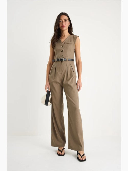 Jumpsuit con scollo a v a gamba ampia con dettaglio fiocco lucci - Kiabi Jumpsuit con scollo a v a gamba ampia con dettaglio fiocco lucci - Kiabi
