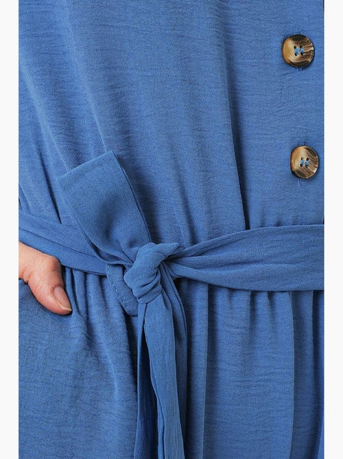 Jumpsuit tinta unita in tessuto con colletto a camicia e dettaglio fiocco bdart - Kiabi Jumpsuit tinta unita in tessuto con colletto a camicia e dettaglio fiocco bdart - Kiabi