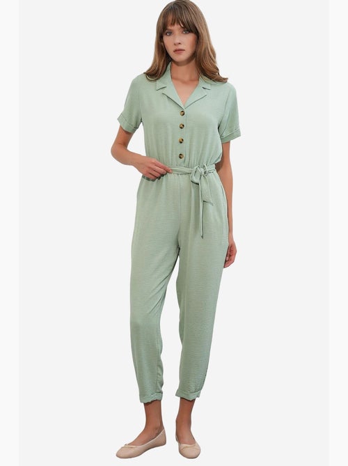 Jumpsuit tinta unita in tessuto con colletto a camicia e dettaglio fiocco bdart - Kiabi Jumpsuit tinta unita in tessuto con colletto a camicia e dettaglio fiocco bdart - Kiabi