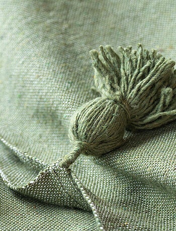 Lancio in lana con nappe