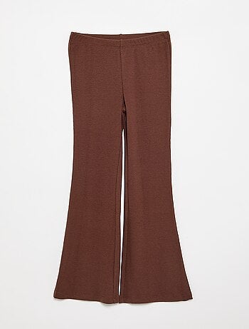 Legging flare in maglia a costine