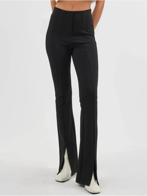 Leggings a zampa a vita alta con dettagli a spacco busem - Kiabi Leggings a zampa a vita alta con dettagli a spacco busem - Kiabi