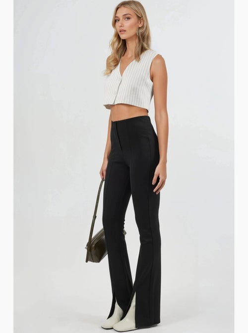 Leggings a zampa a vita alta con dettagli a spacco busem - Kiabi Leggings a zampa a vita alta con dettagli a spacco busem - Kiabi