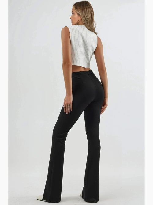 Leggings a zampa a vita alta con dettagli a spacco busem - Kiabi Leggings a zampa a vita alta con dettagli a spacco busem - Kiabi
