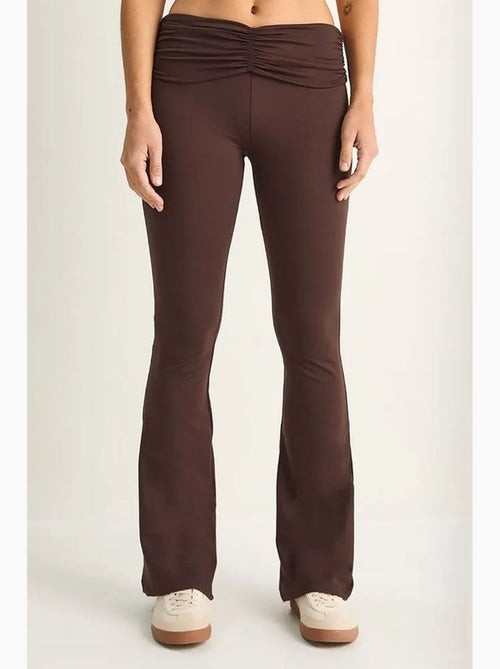 Leggings a zampa a vita alta lucci - Kiabi Leggings a zampa a vita alta lucci - Kiabi