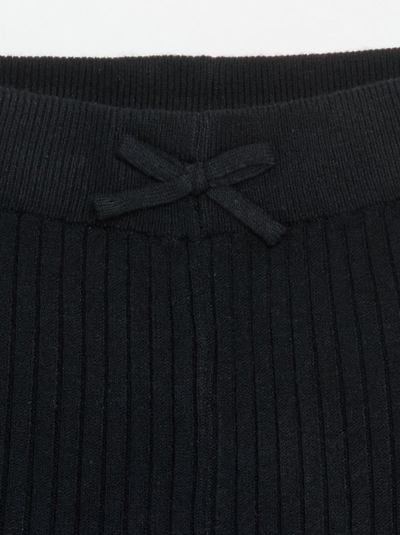 Leggings in maglia tinta unita con fiocco in vita Nero - Kiabi