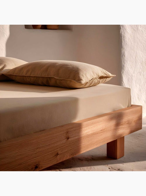 Lenzuolo con angoli tinta unita 100% cotone, per materassi fino a 30 cm di altezza - Gamusi. - Kiabi Lenzuolo con angoli tinta unita 100% cotone, per materassi fino a 30 cm di altezza - Gamusi. - Kiabi