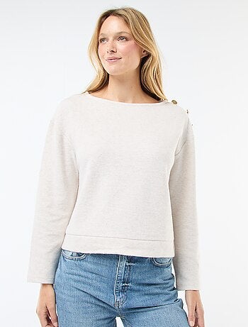 Maglia con bottoni decorativi dorati sulla spalla