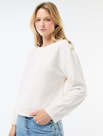 Maglia con bottoni decorativi dorati sulla spalla