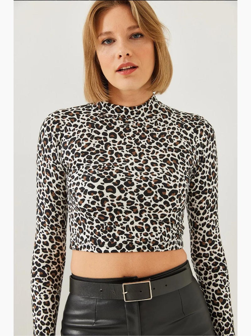 Maglia manica lunga corta collo alto stampa leopardata lucci Bianco Nero - Kiabi