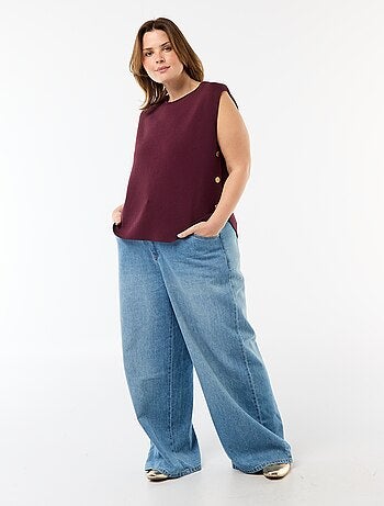 Maglia smanicata con bottoni dorati sul lato