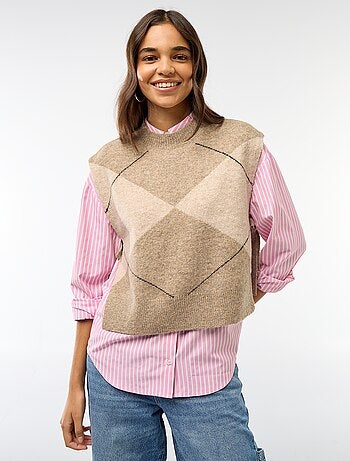 Maglione smanicato con lacci da annodare sui lati