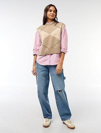 Maglione smanicato con lacci da annodare sui lati