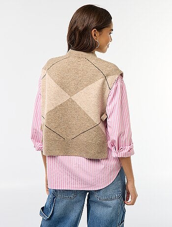 Maglione smanicato con lacci da annodare sui lati