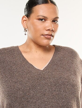 Maglia smanicata tinta unita in maglia tricot