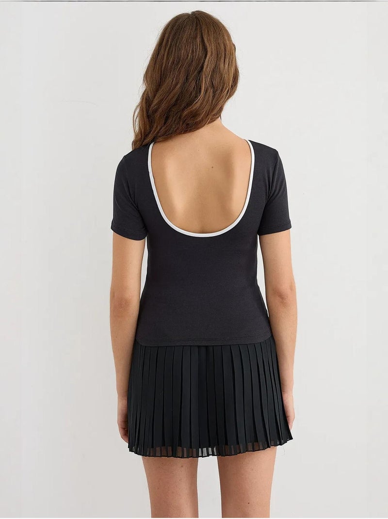 Maglietta basic in jersey con schiena scoperta hiccup Nero - Kiabi