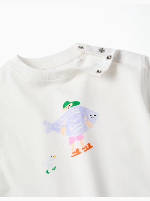 Maglietta in cotone con stampa Carolina Celas x Zippy - Kiabi Maglietta in cotone con stampa Carolina Celas x Zippy - Kiabi