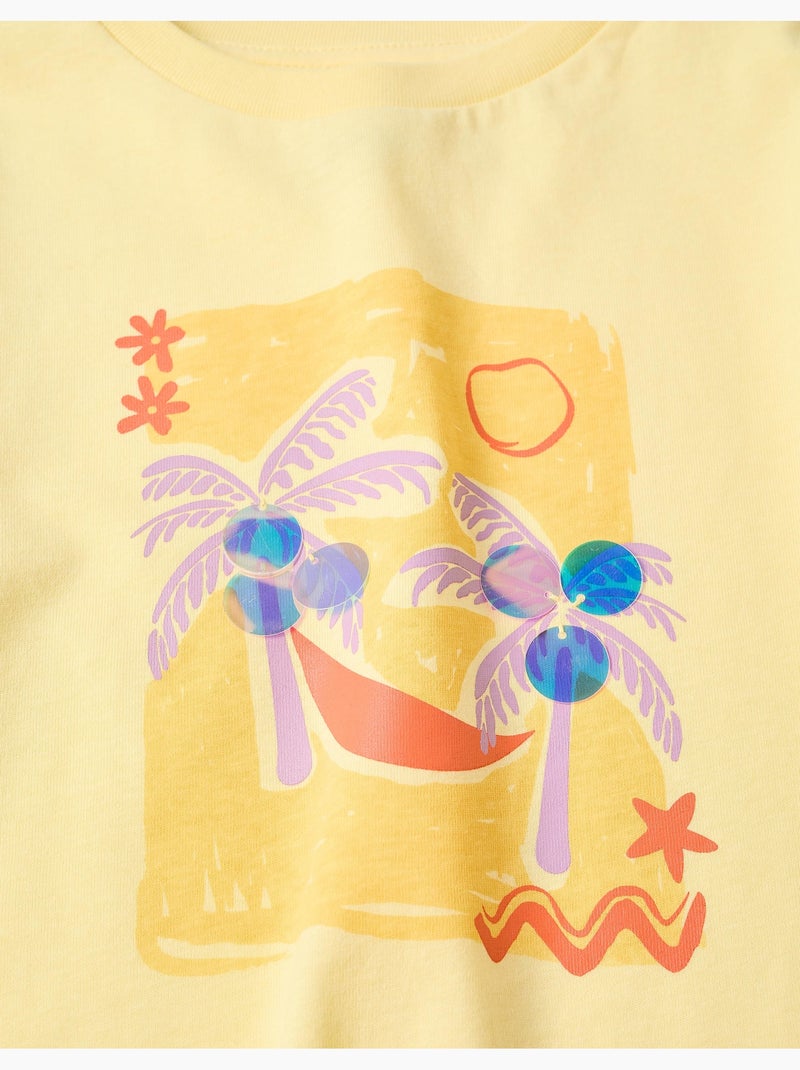 Maglietta in cotone con stampa di palme e paillettes Giallo chiaro - Kiabi
