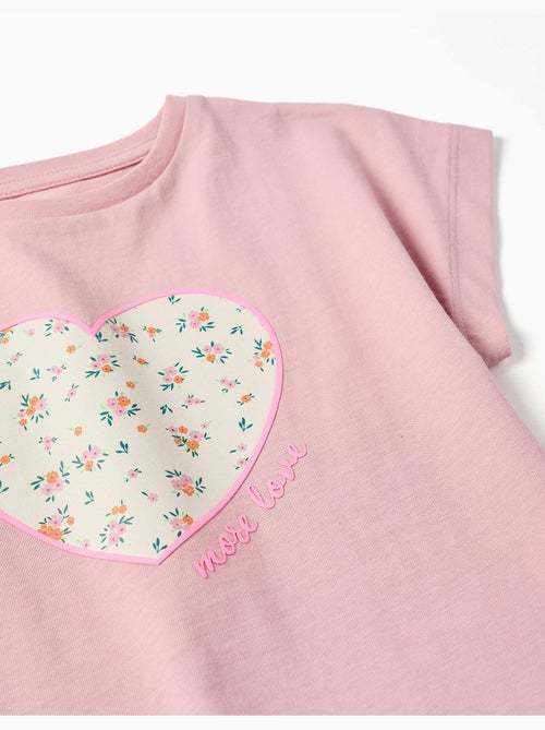 Maglietta in cotone con stampa floreale a forma di cuore - Kiabi Maglietta in cotone con stampa floreale a forma di cuore - Kiabi