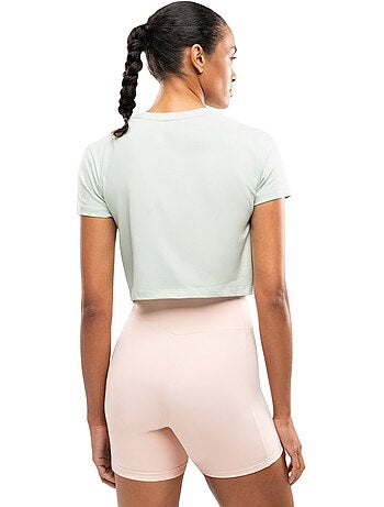 Maglietta sportiva annodata in vita da donna fitness donna space