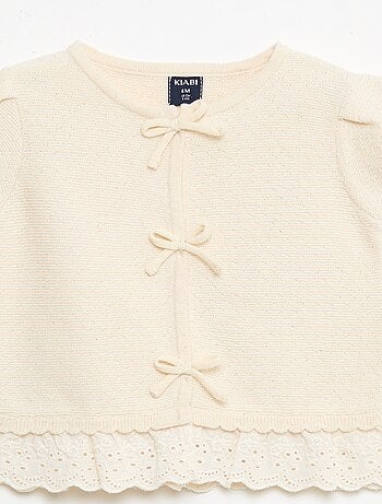 Maglioncino a maniche corte con fiocchi decorativi